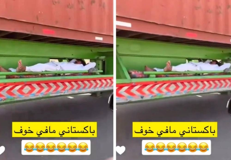 شاهد: وافد باكستاني نائم في الجزء السفلي من شاحنة وهي تسير على طريق سريع!