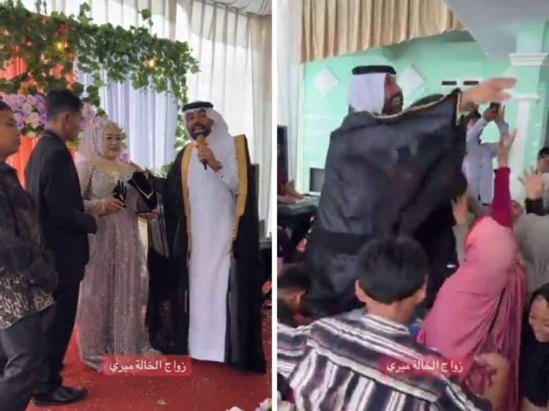 شاهد.. فيديو جديد للشاب السعودي الذي زف خادمتهم لزوجها يقدم لها الهدايا ويلقي الأموال على الحضور